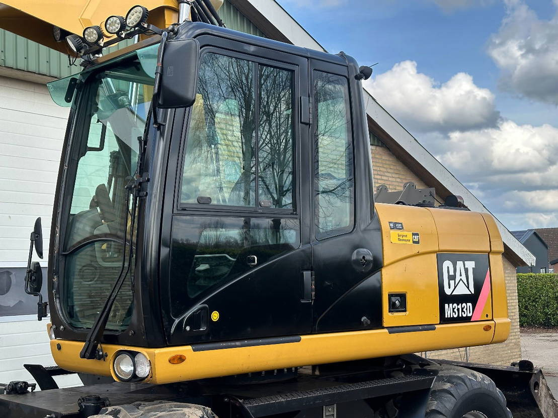 Caterpillar M313D - Pelle sur pneus: photos 5 Caterpillar M313D - Pelle sur pneus: photos 5