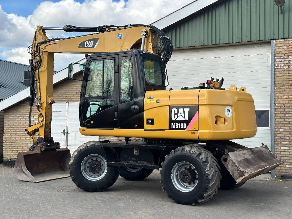 Caterpillar M313D - Pelle sur pneus: photos 4 Caterpillar M313D - Pelle sur pneus: photos 4