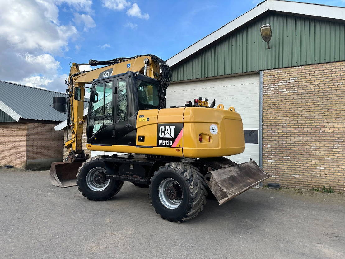 Caterpillar M313D - Pelle sur pneus: photos 2 Caterpillar M313D - Pelle sur pneus: photos 2