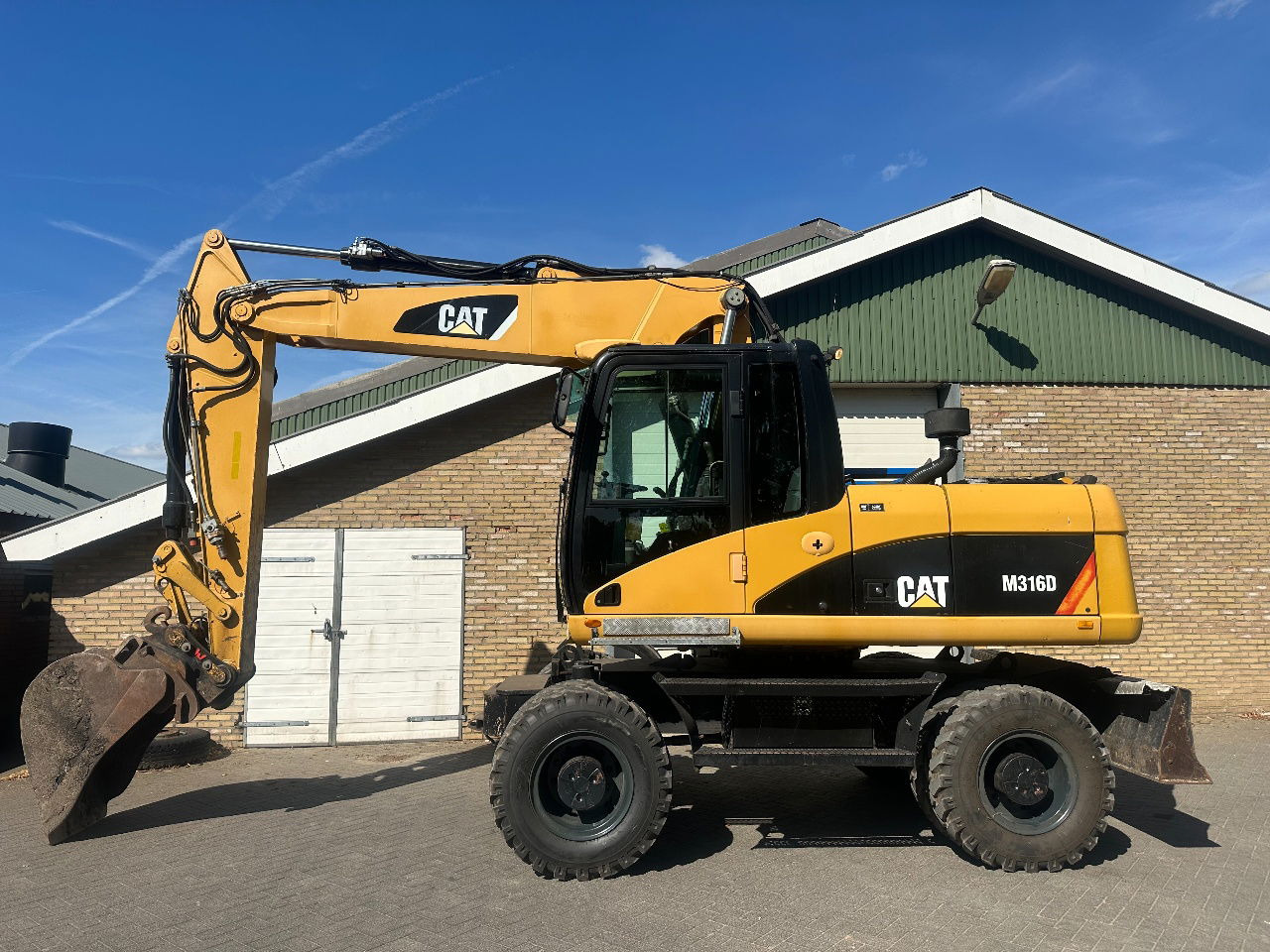 Caterpillar M316D - Chargeuse sur pneus: photos 1 Caterpillar M316D - Chargeuse sur pneus: photos 1