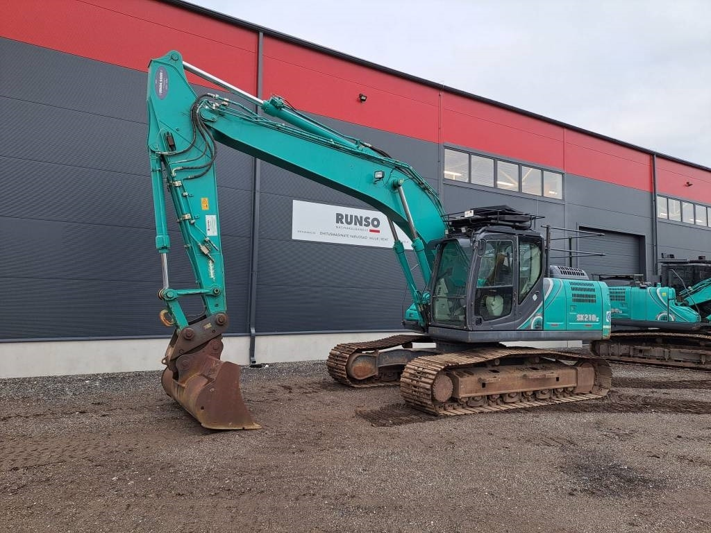 Kobelco SK 210 LC-10 - Pelle sur chenille: photos 1 Kobelco SK 210 LC-10 - Pelle sur chenille: photos 1