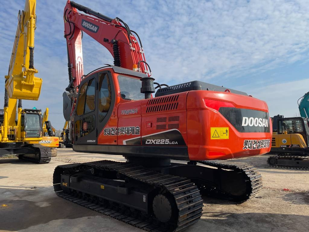 Doosan DX 225 LCA - Pelle sur chenille: photos 1 Doosan DX 225 LCA - Pelle sur chenille: photos 1