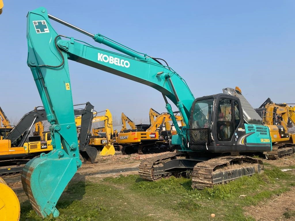 Kobelco SK 200 - Pelle sur chenille: photos 5 Kobelco SK 200 - Pelle sur chenille: photos 5