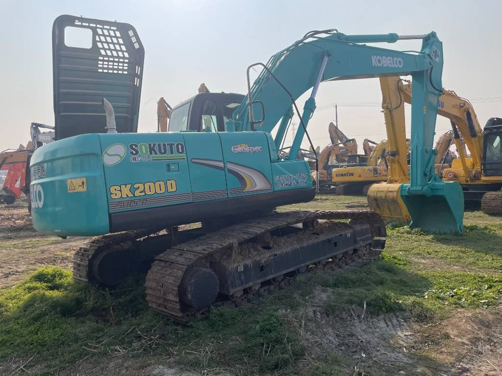 Kobelco SK 200 - Pelle sur chenille: photos 1 Kobelco SK 200 - Pelle sur chenille: photos 1
