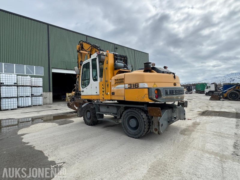 2009 Liebherr A316 Litronic hjulgraver - Hevbar hytte - Klype - 13065T - Pelle: photos 3 2009 Liebherr A316 Litronic hjulgraver - Hevbar hytte - Klype - 13065T - Pelle: photos 3