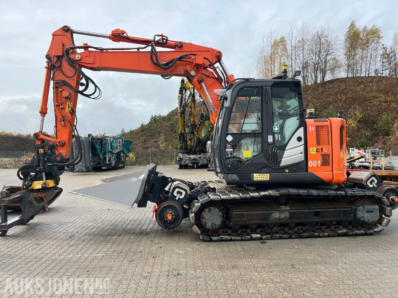 2015 Hitachi ZX135-US Rail maskin med henger, tilt, klype, 6 skuffer, klype - Pelle: photos 2 2015 Hitachi ZX135-US Rail maskin med henger, tilt, klype, 6 skuffer, klype - Pelle: photos 2