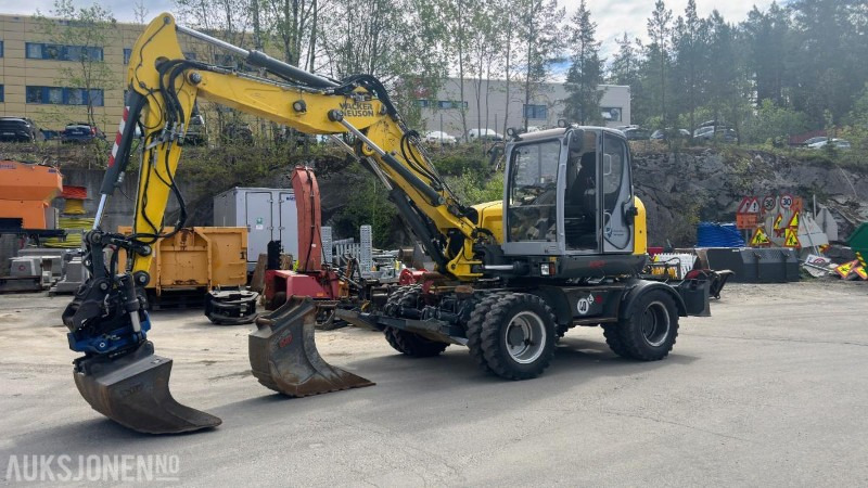 2015 Wacker Neuson EW100 Gravemaskin / Hjulgraver Tiltrotator Pusseskuffe Kabelskuffe 3224 timer - Pelle: photos 1 2015 Wacker Neuson EW100 Gravemaskin / Hjulgraver Tiltrotator Pusseskuffe Kabelskuffe 3224 timer - Pelle: photos 1