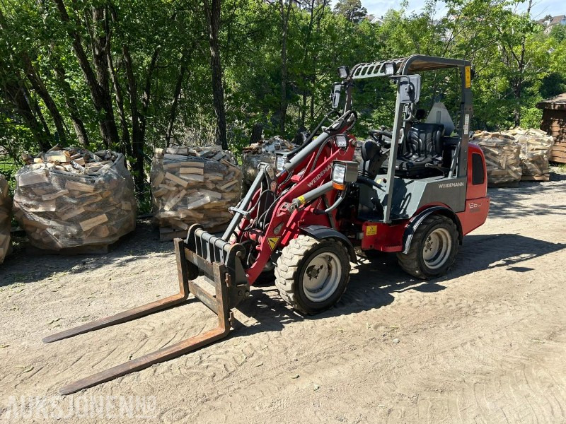 Weidemann 1260 CLASSIC HJULLASTER-PALLEGAFFEL-SKUFFE - Chargeuse sur pneus: photos 1 Weidemann 1260 CLASSIC HJULLASTER-PALLEGAFFEL-SKUFFE - Chargeuse sur pneus: photos 1