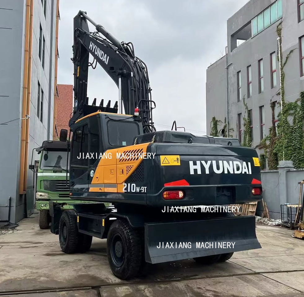 Hyundai 210w-9 wheel excavator - Pelle sur pneus: photos 4 Hyundai 210w-9 wheel excavator - Pelle sur pneus: photos 4