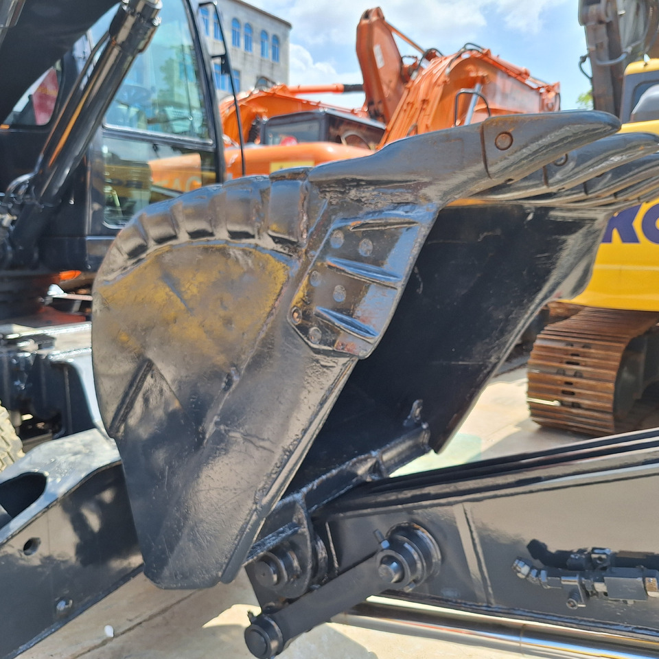 Hyundai 210w-9T wheel excavator - Pelle sur pneus: photos 4 Hyundai 210w-9T wheel excavator - Pelle sur pneus: photos 4