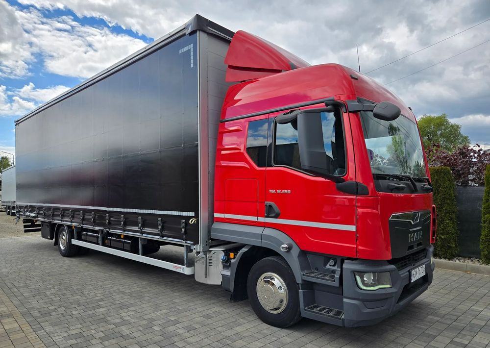 MAN TGL 12.250 - Camion à rideaux coulissants: photos 3 MAN TGL 12.250 - Camion à rideaux coulissants: photos 3