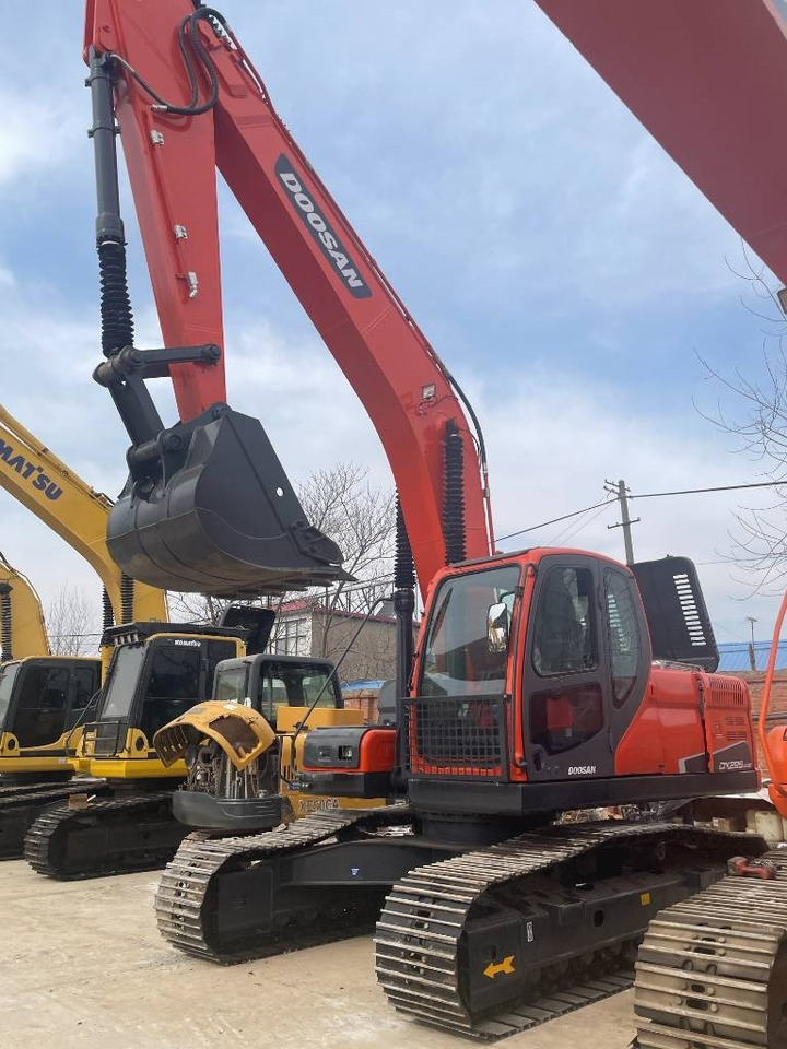 Doosan DX 225 LC - Pelle sur chenille: photos 1 Doosan DX 225 LC - Pelle sur chenille: photos 1