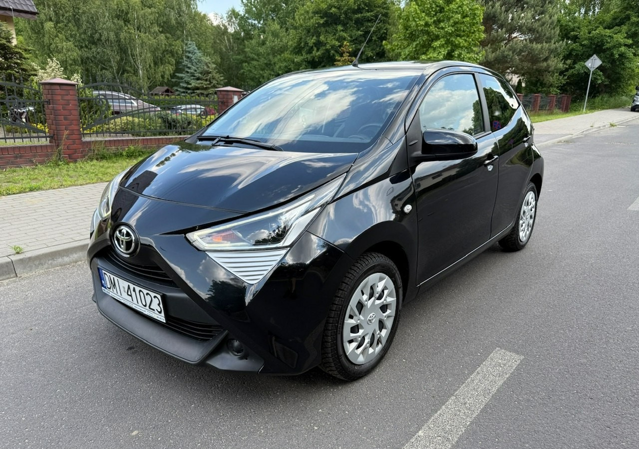Toyota Aygo II Toyota Aygo 1.0-16V Klima Salon PL 24651km Model 2021 - Voiture à hayon: photos 1 Toyota Aygo II Toyota Aygo 1.0-16V Klima Salon PL 24651km Model 2021 - Voiture à hayon: photos 1