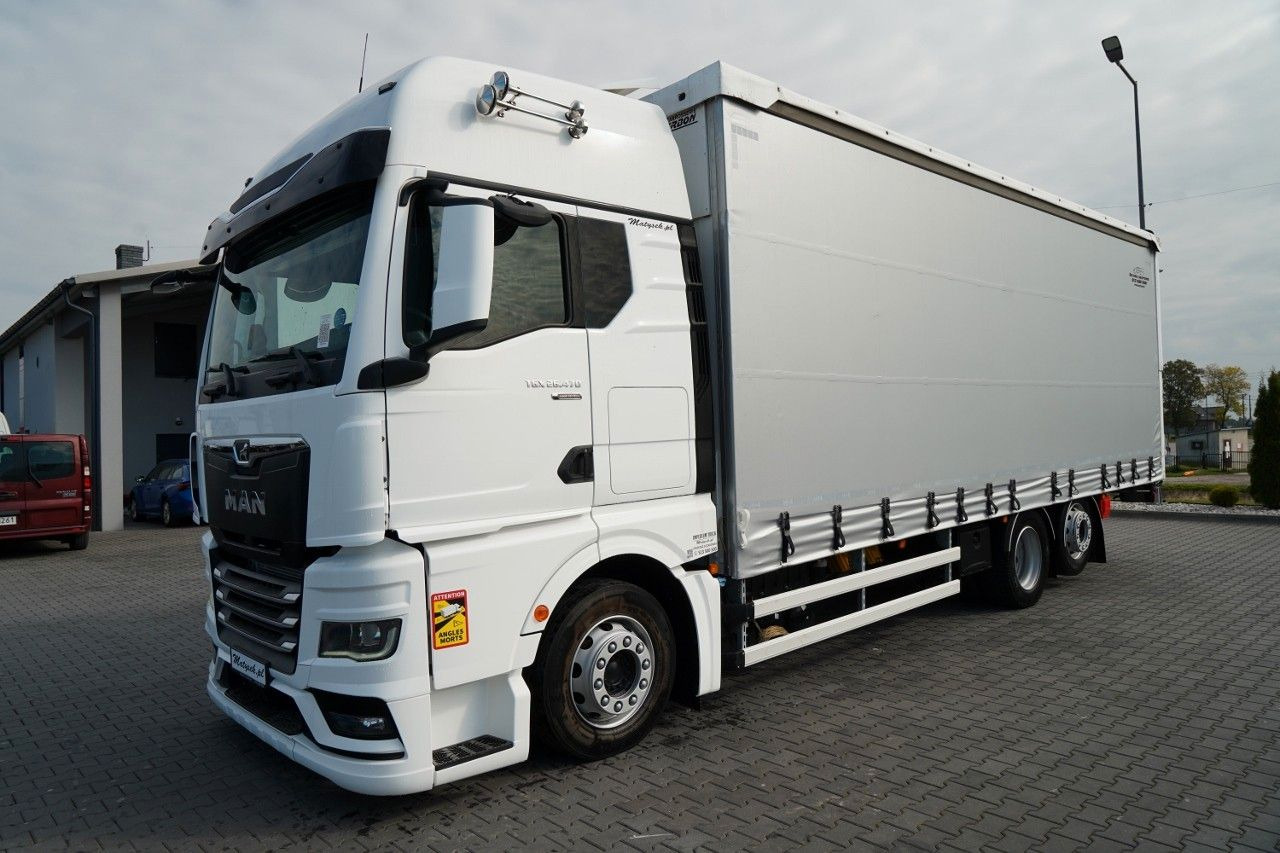 MAN TGX 26.470 / 6x2 / FIRANKA / SOLÓWKA / 6x2 / 12 - Camion à rideaux coulissants: photos 2 MAN TGX 26.470 / 6x2 / FIRANKA / SOLÓWKA / 6x2 / 12 - Camion à rideaux coulissants: photos 2