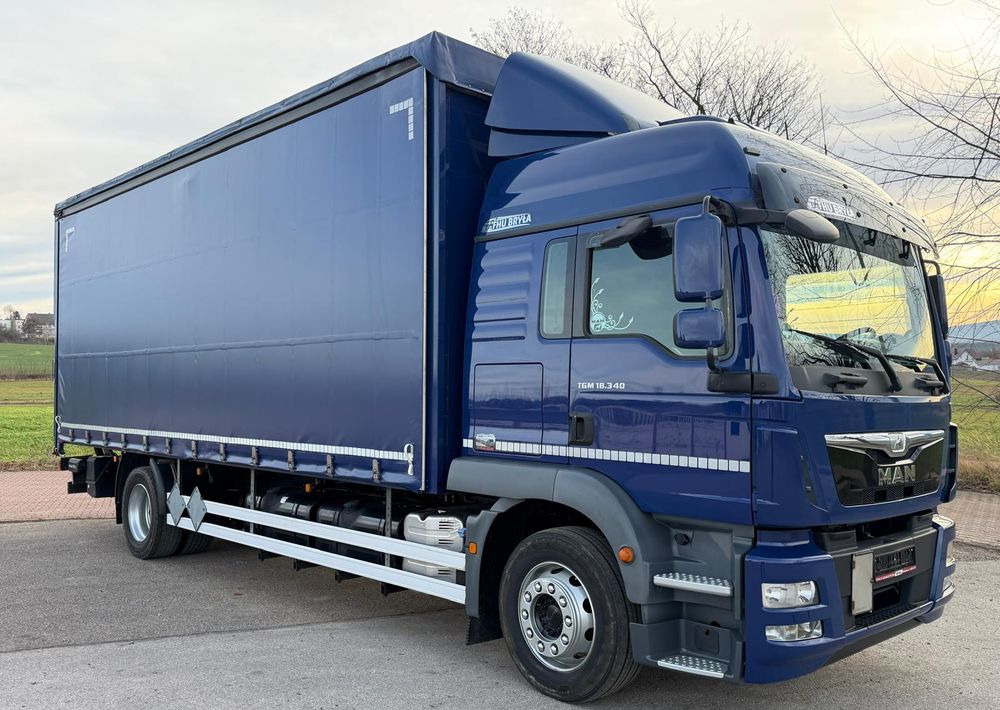 MAN TGM 18.340 / FIRANKA / SPROWADZONY / 9100 ŁADOWNOŚĆ / 18 PALET / E6 / WINDA / - Camion à rideaux coulissants: photos 1 MAN TGM 18.340 / FIRANKA / SPROWADZONY / 9100 ŁADOWNOŚĆ / 18 PALET / E6 / WINDA / - Camion à rideaux coulissants: photos 1