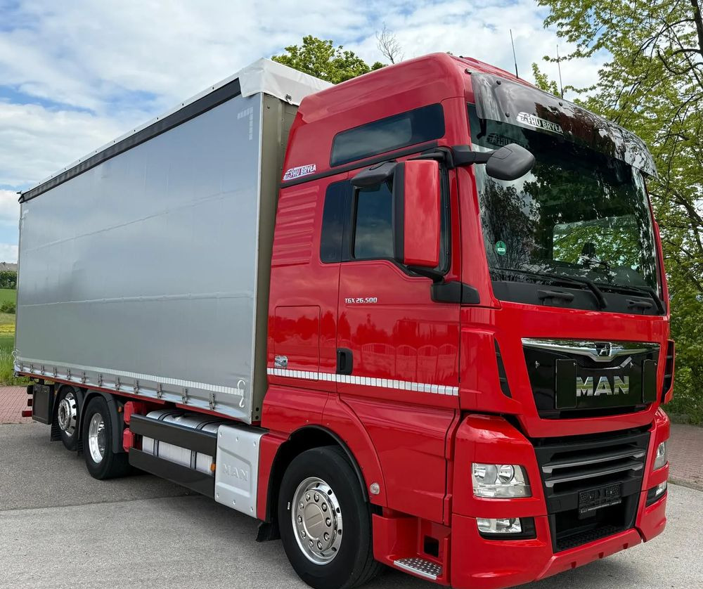 MAN TGX 26.500 / LIFT / 6X2 / KLIMA POSTOJOWA / 18PALET / E6 / FIRANKA / 18 TON ŁADOWNOŚĆ / WINDA / NISKI PRZEBIEG / JEDEN WŁAŚCICIEL / PODWIESZANA OŚ - Camion à rideaux coulissants: photos 2 MAN TGX 26.500 / LIFT / 6X2 / KLIMA POSTOJOWA / 18PALET / E6 / FIRANKA / 18 TON ŁADOWNOŚĆ / WINDA / NISKI PRZEBIEG / JEDEN WŁAŚCICIEL / PODWIESZANA OŚ - Camion à rideaux coulissants: photos 2