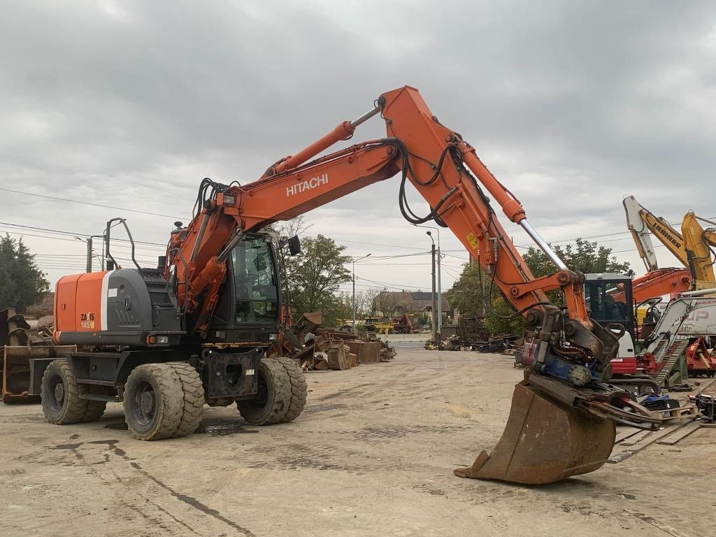 Hitachi ZX 145 W-3+SMP Rototilt - Pelle sur pneus: photos 4 Hitachi ZX 145 W-3+SMP Rototilt - Pelle sur pneus: photos 4
