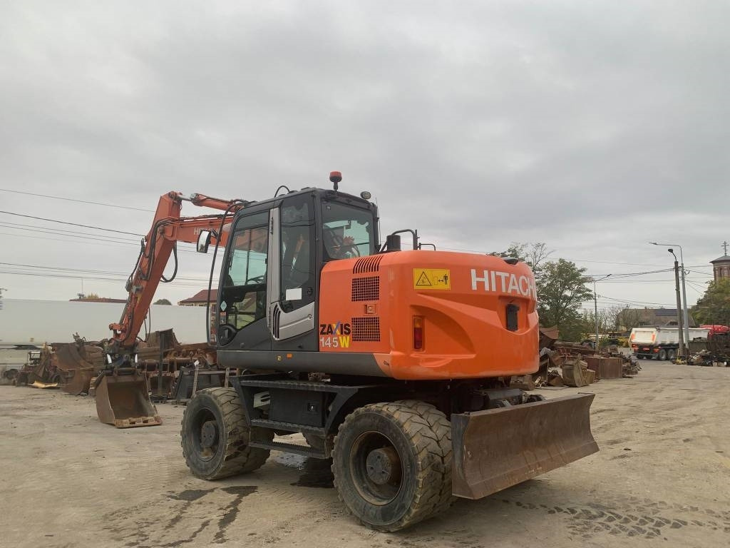 Hitachi ZX 145 W-3+SMP Rototilt - Pelle sur pneus: photos 3 Hitachi ZX 145 W-3+SMP Rototilt - Pelle sur pneus: photos 3