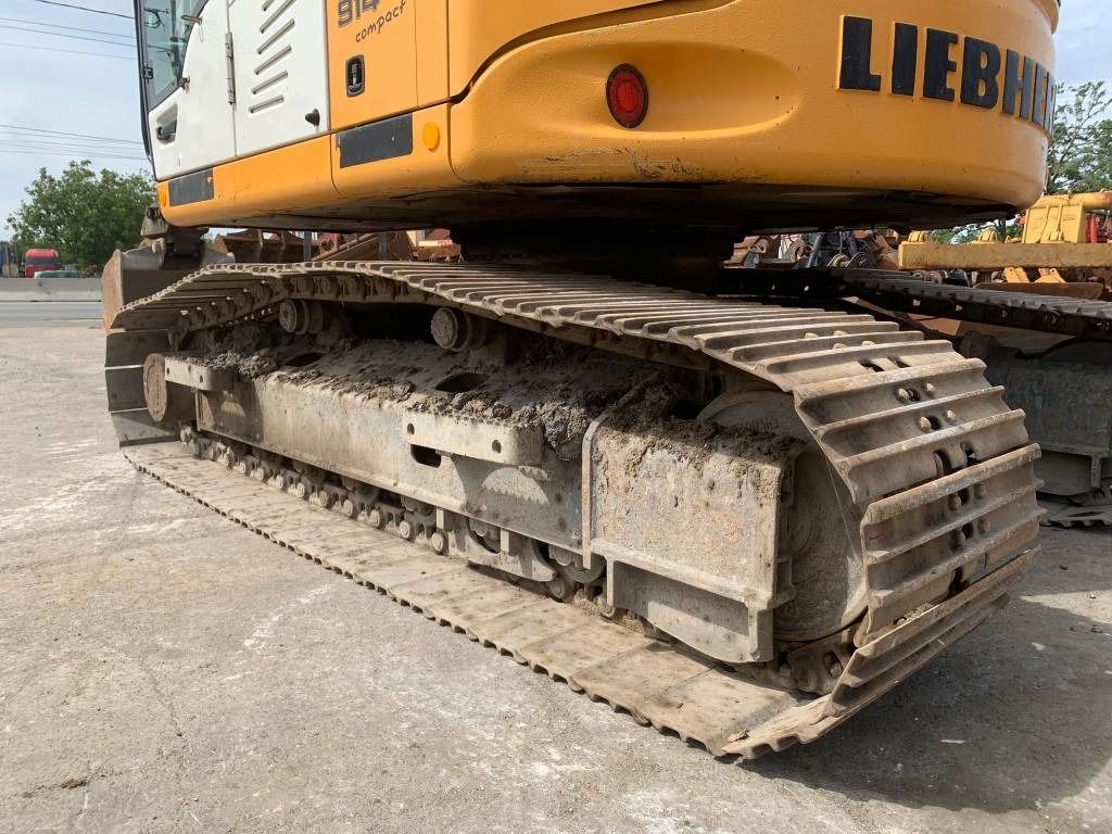 Pelle sur pneus Liebherr R 914 Compact Litronic: photos 8