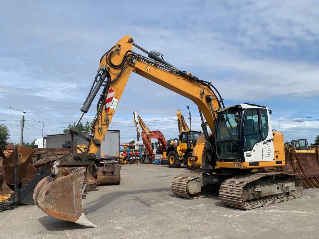 Liebherr R 914 Compact Litronic - Pelle sur pneus: photos 1 Liebherr R 914 Compact Litronic - Pelle sur pneus: photos 1