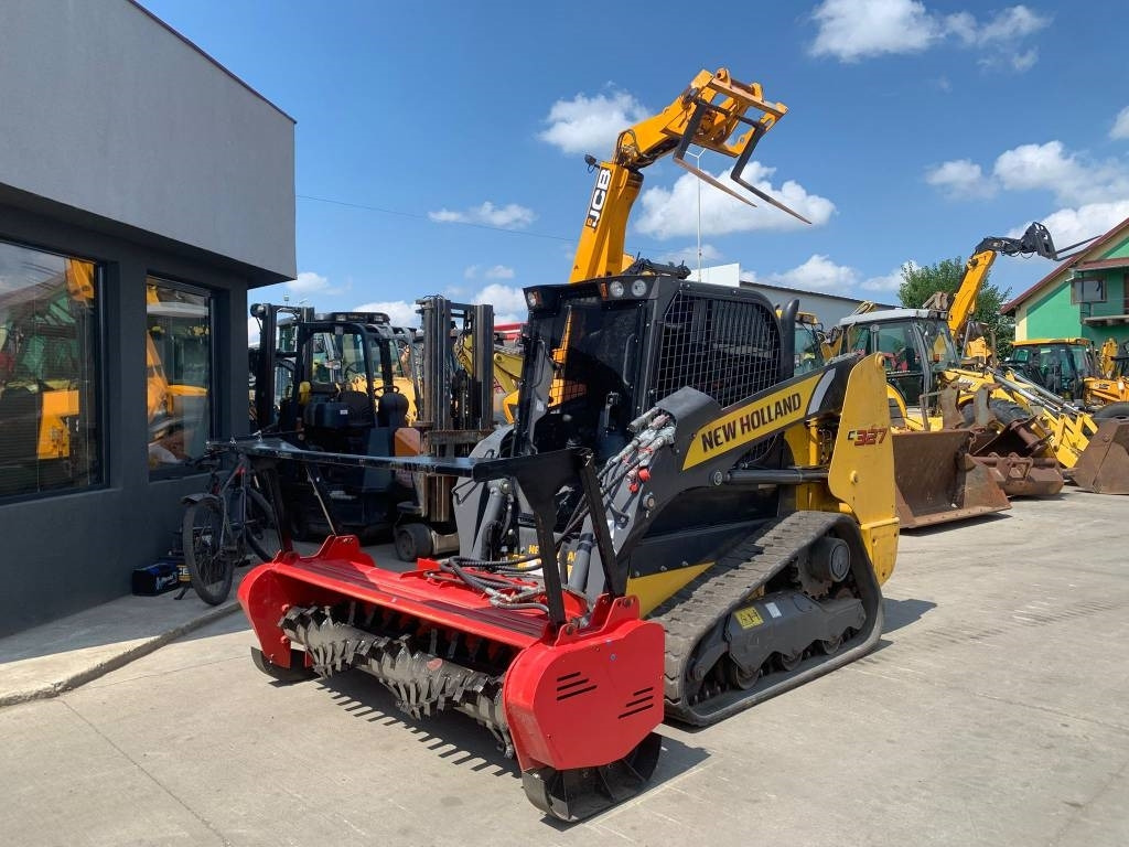 New Holland C327  - Mini chargeuse: photos 1 New Holland C327  - Mini chargeuse: photos 1
