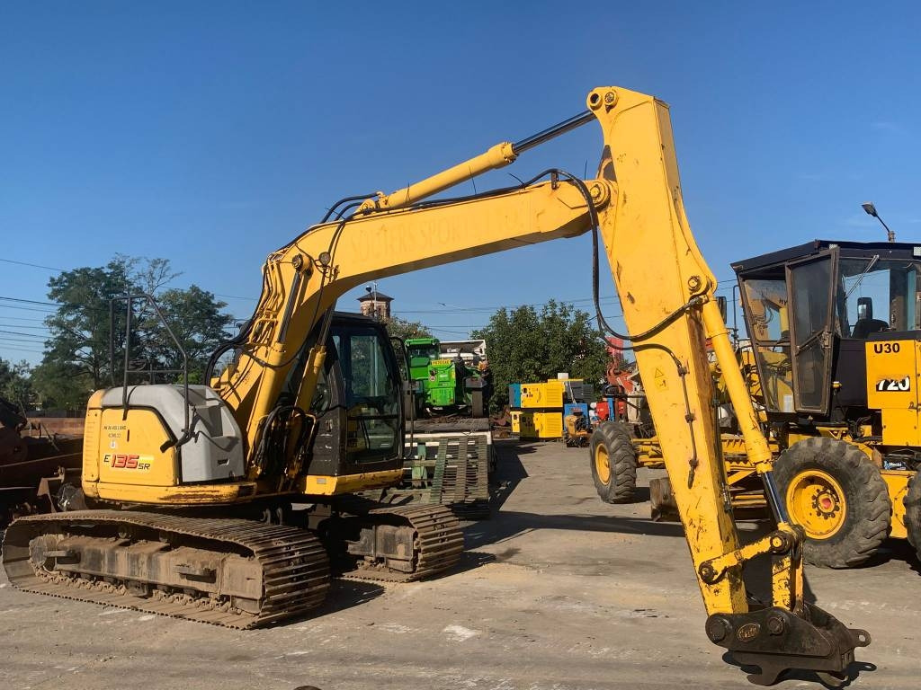 New Holland E 135 SR  - Pelle sur chenille: photos 1 New Holland E 135 SR  - Pelle sur chenille: photos 1