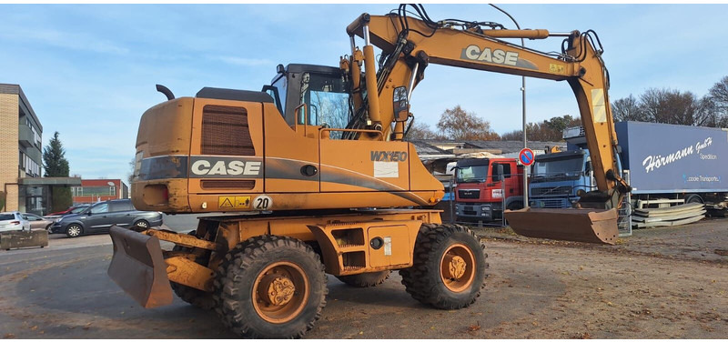 Case WX150 - Pelle sur pneus: photos 4 Case WX150 - Pelle sur pneus: photos 4