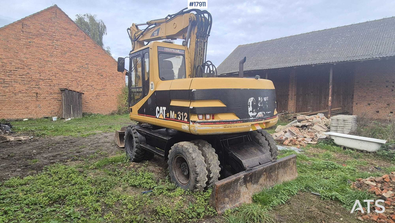 2000 CAT M312 - Pelle sur pneus: photos 4 2000 CAT M312 - Pelle sur pneus: photos 4