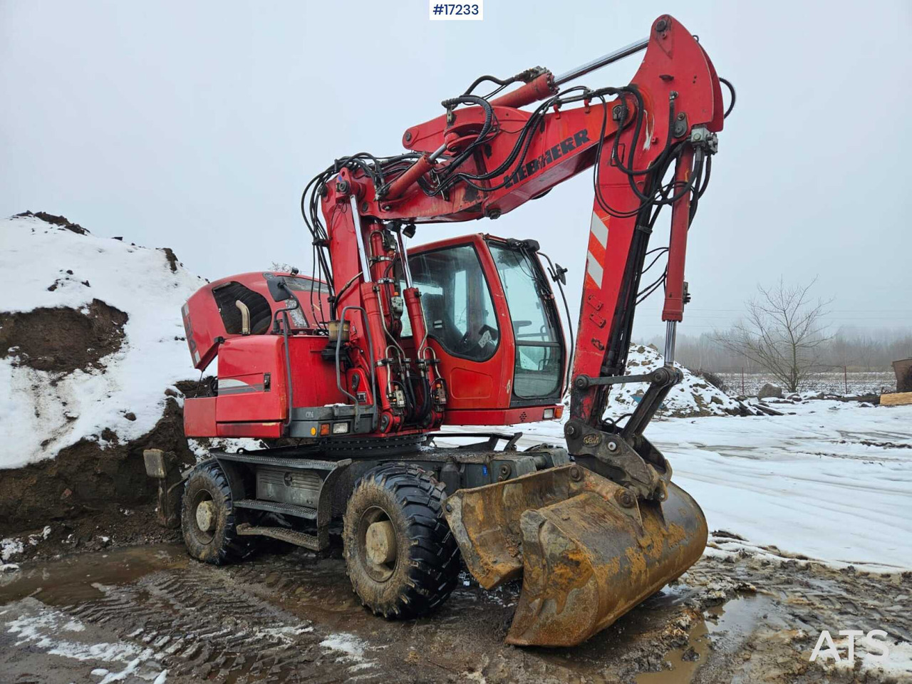 LIEBHERR 314 Litronic wheeled excavator (2008) - Pelle sur pneus: photos 1 LIEBHERR 314 Litronic wheeled excavator (2008) - Pelle sur pneus: photos 1