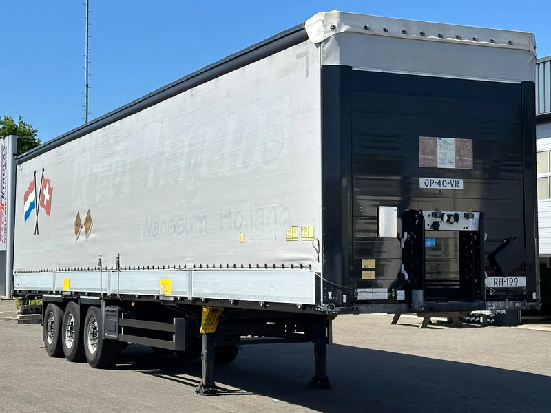 Schmitz Cargobull Schuifzeil met Borden / Disc-Brakes / Huckepack / Code XL - Semi-remorque rideaux coulissants: photos 4 Schmitz Cargobull Schuifzeil met Borden / Disc-Brakes / Huckepack / Code XL - Semi-remorque rideaux coulissants: photos 4
