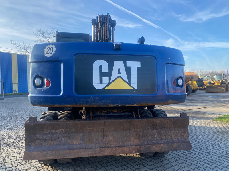 Caterpillar M322 D NVT - Pelle sur pneus: photos 4 Caterpillar M322 D NVT - Pelle sur pneus: photos 4