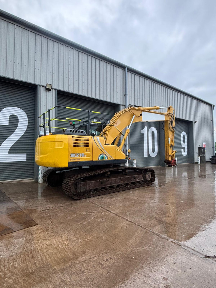 Kobelco SK210LC-10E - Pelle sur chenille: photos 5 Kobelco SK210LC-10E - Pelle sur chenille: photos 5