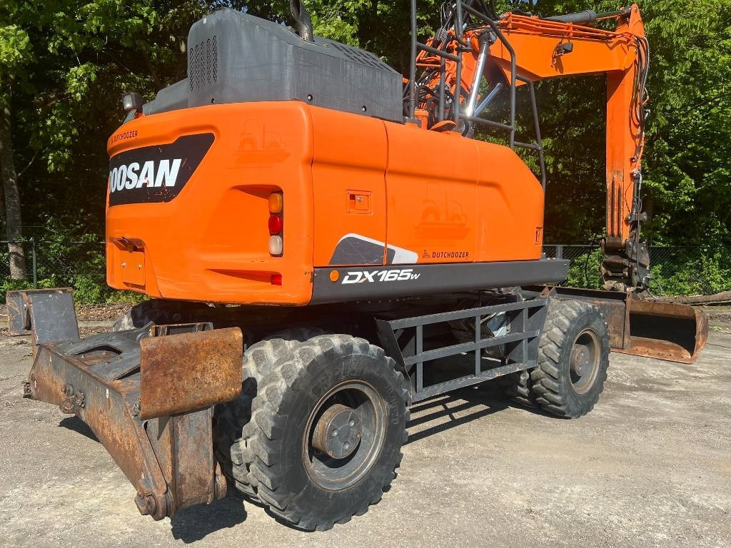 Doosan DX 165 W-5 - Pelle sur pneus: photos 4 Doosan DX 165 W-5 - Pelle sur pneus: photos 4