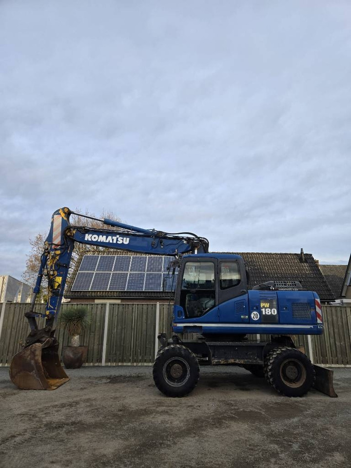 Komatsu PW 180-7EO - Pelle sur pneus: photos 1 Komatsu PW 180-7EO - Pelle sur pneus: photos 1