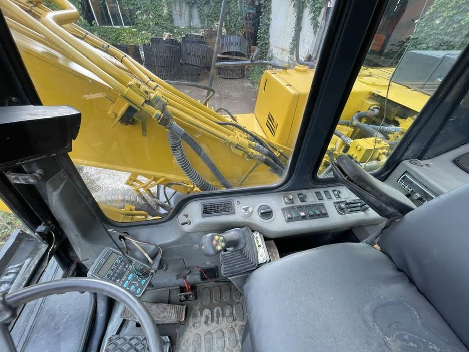 Pelle sur pneus Komatsu PC160LC: photos 7