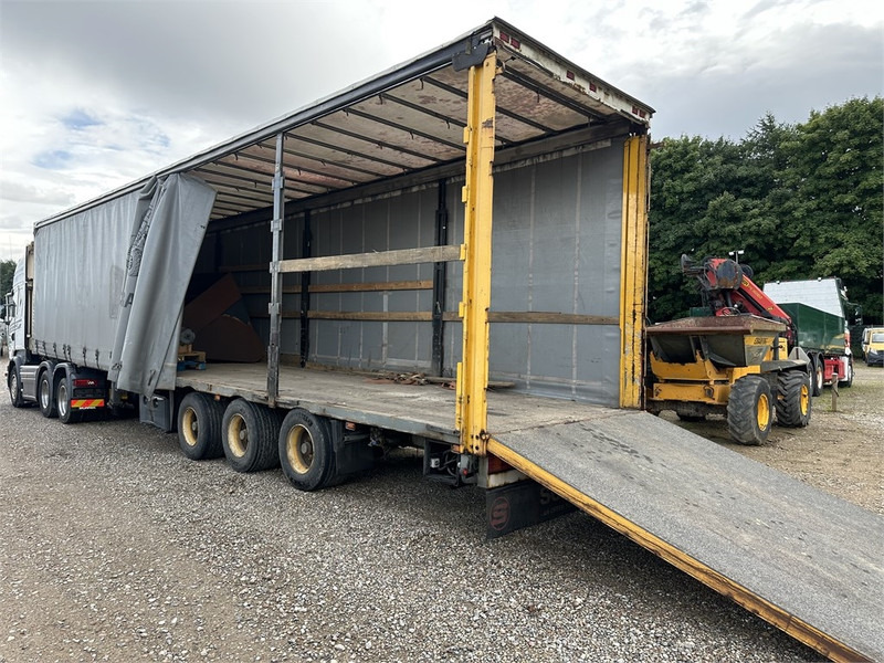 Schmitz Cargobull Machine transport trailer with bag ramp - Semi-remorque: photos 3 Schmitz Cargobull Machine transport trailer with bag ramp - Semi-remorque: photos 3