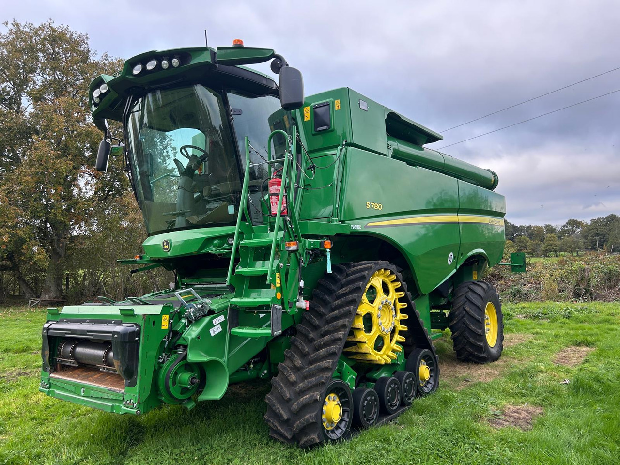 John Deere S780 - Moissonneuse-batteuse: photos 1 John Deere S780 - Moissonneuse-batteuse: photos 1