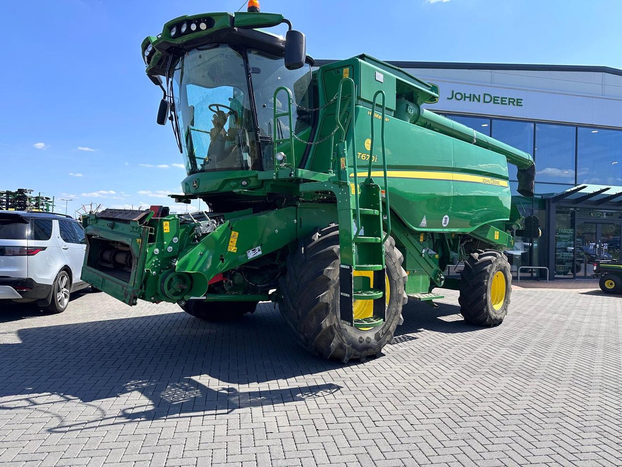 John Deere T670i HM - Moissonneuse-batteuse: photos 1 John Deere T670i HM - Moissonneuse-batteuse: photos 1