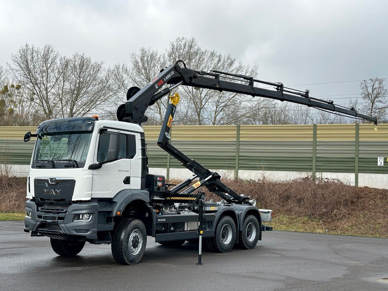 MAN TGS 33.440 6x6 BB Abrollkipper+Kran Hiab 228-6 - Camion ampliroll, Camion grue: photos 1 MAN TGS 33.440 6x6 BB Abrollkipper+Kran Hiab 228-6 - Camion ampliroll, Camion grue: photos 1