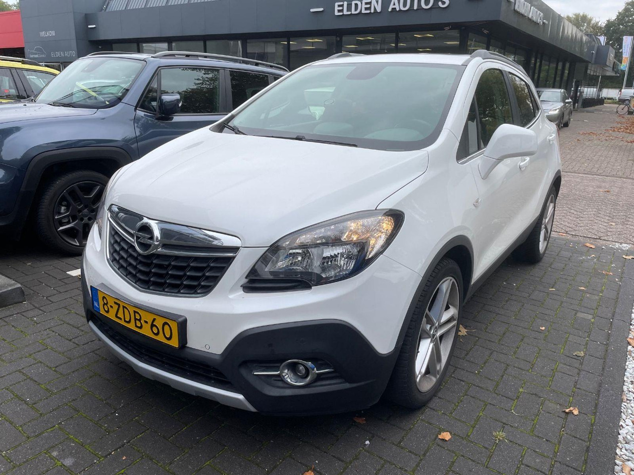 Opel Mokka 1.4 T Cosmo | 2014 | 98.606 km | 8ZDB60 | NAP: Logisch - SUV: photos 1 Opel Mokka 1.4 T Cosmo | 2014 | 98.606 km | 8ZDB60 | NAP: Logisch - SUV: photos 1