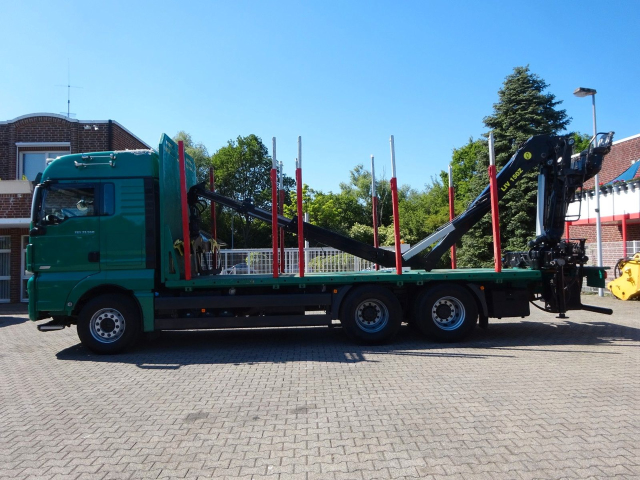 MAN 33.560 TGX mit TAJFUN L150Z Holzladekran 6x4 - Camion grumier, Camion grue: photos 3 MAN 33.560 TGX mit TAJFUN L150Z Holzladekran 6x4 - Camion grumier, Camion grue: photos 3