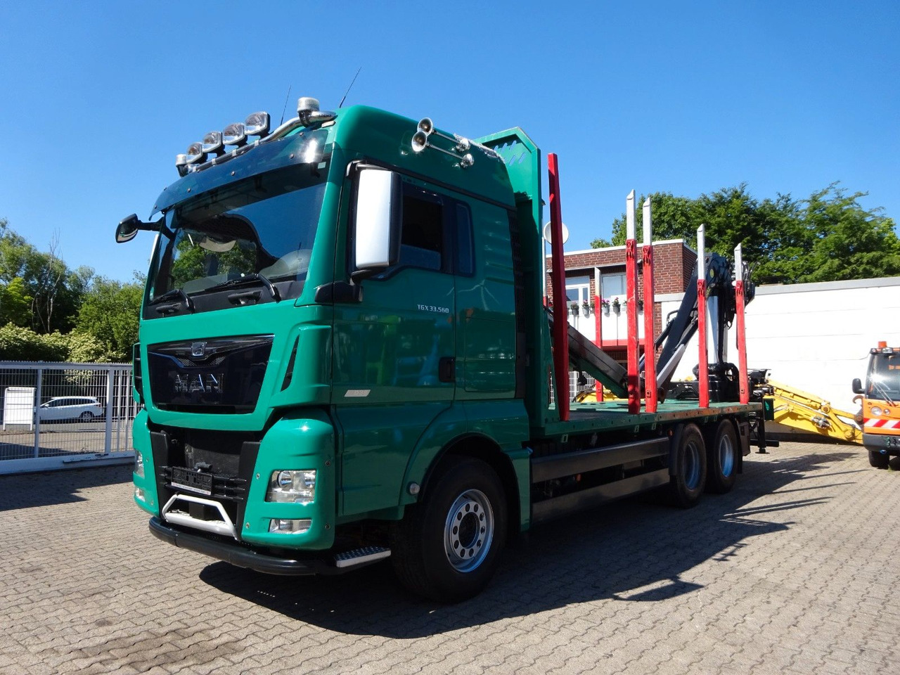 MAN 33.560 TGX mit TAJFUN L150Z Holzladekran 6x4 - Camion grumier, Camion grue: photos 2 MAN 33.560 TGX mit TAJFUN L150Z Holzladekran 6x4 - Camion grumier, Camion grue: photos 2