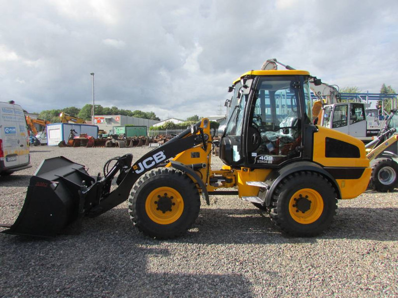 JCB 409 Radlader 46.500 EUR - Chargeuse sur pneus: photos 1 JCB 409 Radlader 46.500 EUR - Chargeuse sur pneus: photos 1