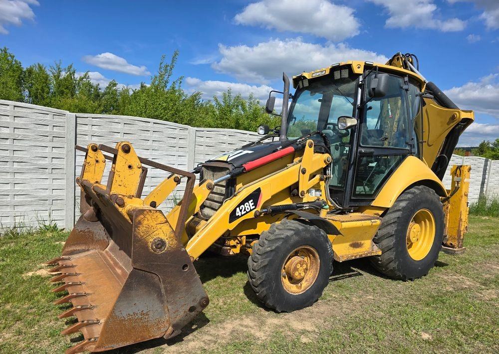 Caterpillar - Tractopelle: photos 1 Caterpillar - Tractopelle: photos 1