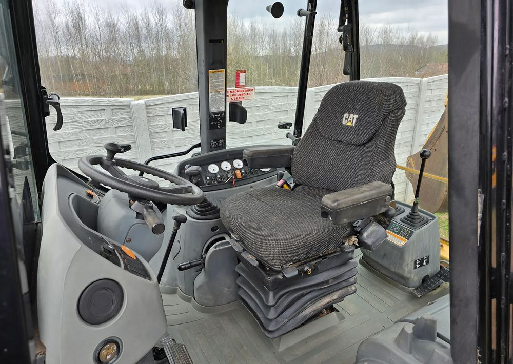 Caterpillar - Tractopelle: photos 2 Caterpillar - Tractopelle: photos 2