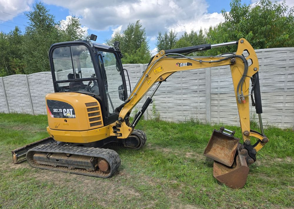 Caterpillar - Mini pelle: photos 1 Caterpillar - Mini pelle: photos 1