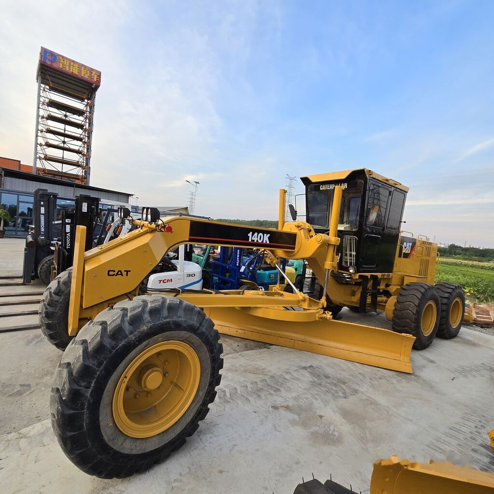 Caterpillar 140K - Niveleuse: photos 1 Caterpillar 140K - Niveleuse: photos 1