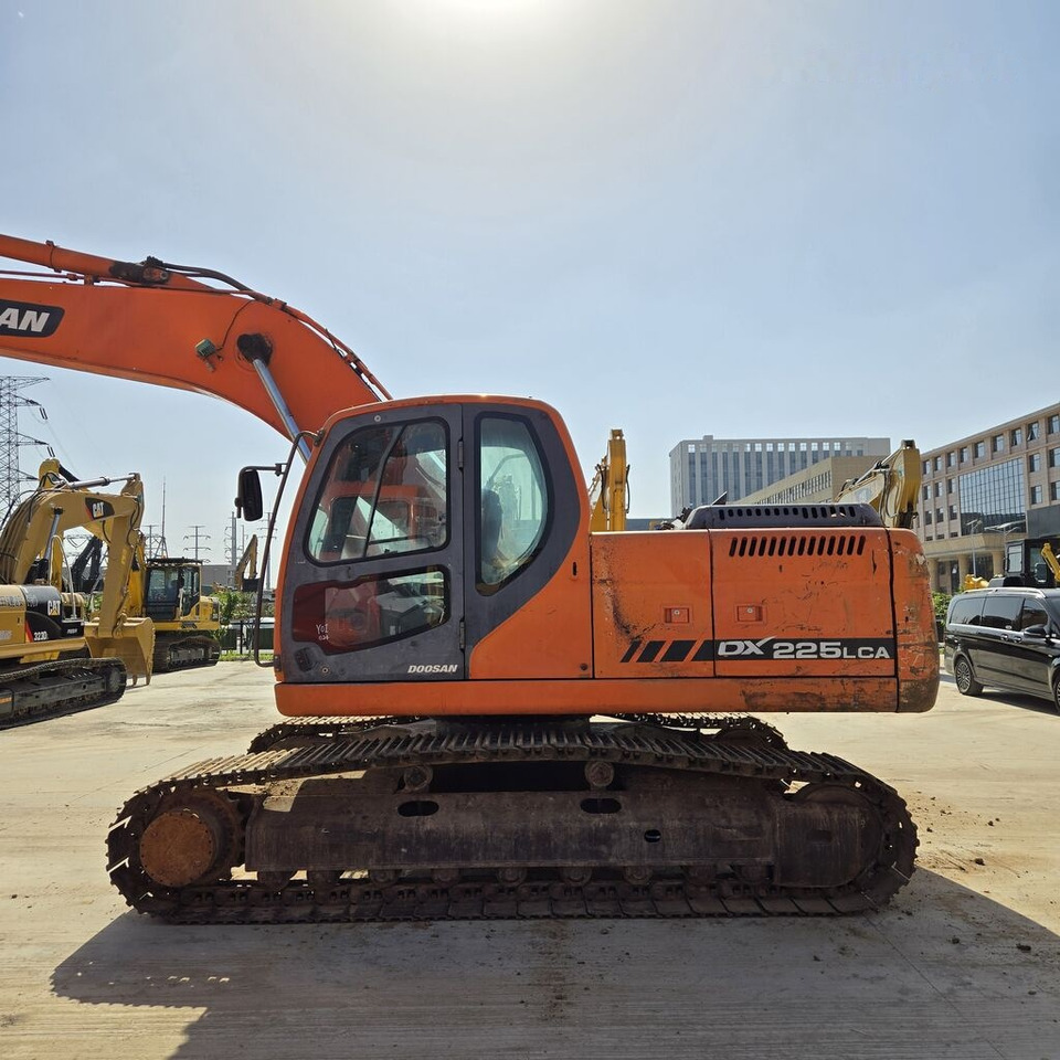 Doosan DX225LCA - Pelle sur chenille: photos 3 Doosan DX225LCA - Pelle sur chenille: photos 3