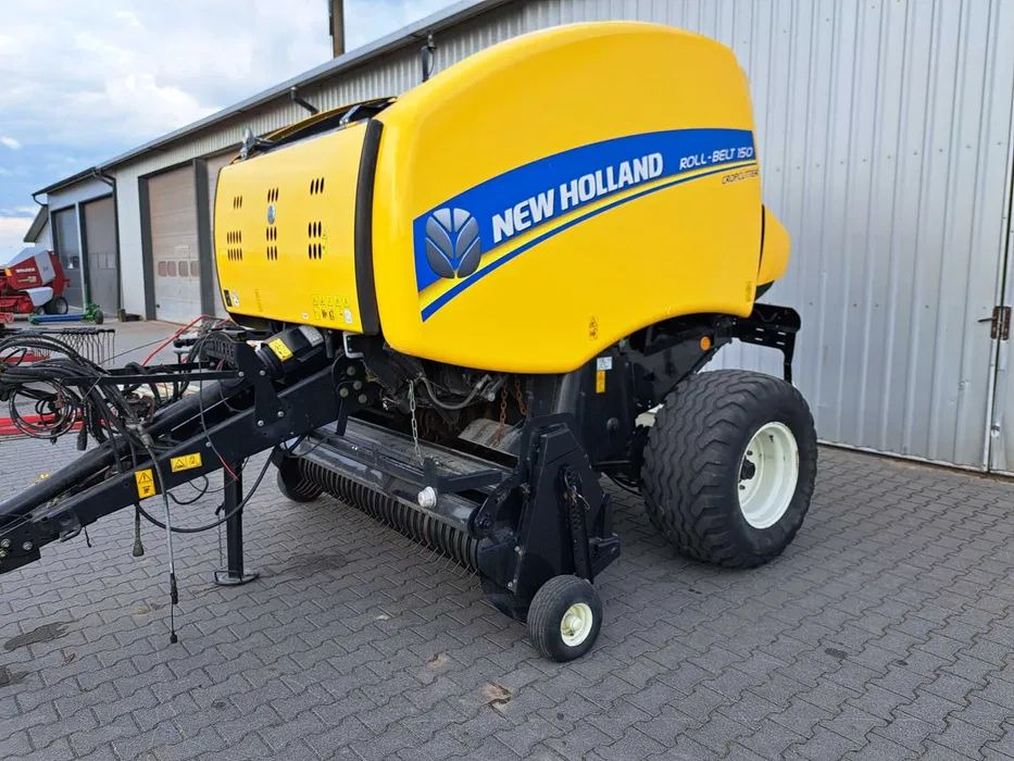 New Holland roll-belt 150 cropcutter - Presse à balles rondes: photos 1 New Holland roll-belt 150 cropcutter - Presse à balles rondes: photos 1