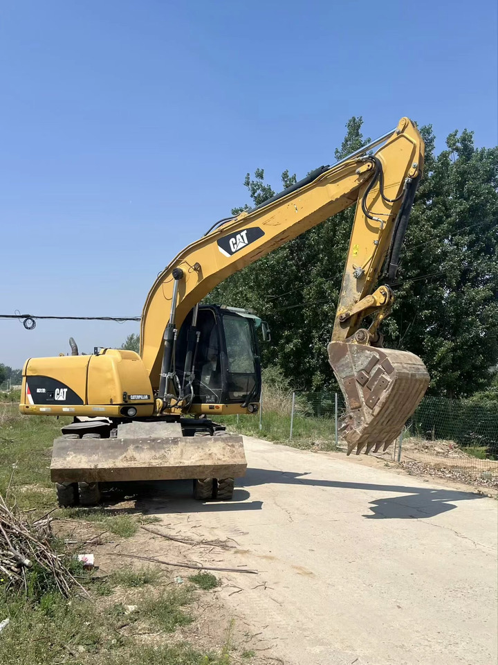 CATERPILLAR M317D2 - Pelle sur pneus: photos 5 CATERPILLAR M317D2 - Pelle sur pneus: photos 5